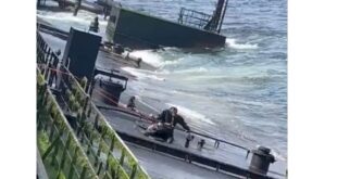 Salvor at work on the oily, inclined deck of the Caroline Bezengi (supplied)