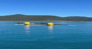 capsized racing yacht