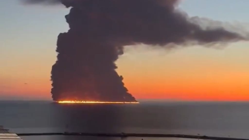1791412665_6ac6c9b92172e A burning slick spreads from the tanker Aframax Rio off Sochi, Oct. 6. The fire has since been extinguished (Russian social media)